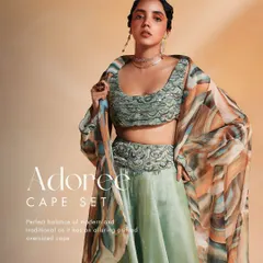 The Adoree Cape Set is a perfect balance of modern and traditional. I designed it with an alluring printed oversized cape, a hand-adorned bustier, and swirl-worthy flared pants.