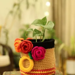 A side view of the bold and beautiful Frida Basket. You can see the colourful roses and the striped details that make this piece so special.