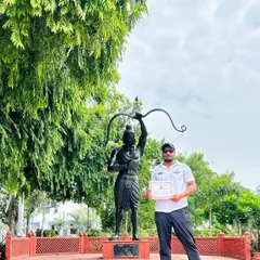 Holding my NIS coaching certificate on the institute's campus. I am proud to have been trained at one of India's top sports institutions.