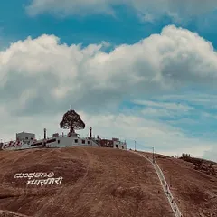 The iconic view of Mandaragiri Hill with its unique Jain temple. This one-day trip offers a great mix of trekking and cultural exploration.