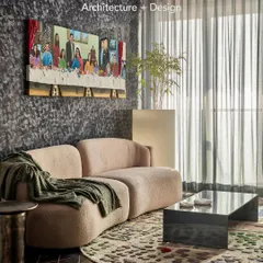 This is the living room for "The Party Pad." We went with a dark, cozy color palette and a custom art piece depicting our version of The Last Supper. The ceiling is a backlit vinyl that can change colors to set the mood for any party.