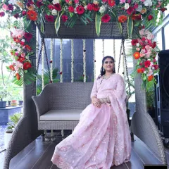 Another shot of the elegant baby shower decor, showing the beautiful mother-to-be in her special seat.