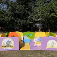 All set up and ready for a day of fun in the sun. My portable soft play areas can be installed on any flat surface, like this grassy lawn, creating an instant, safe playground.