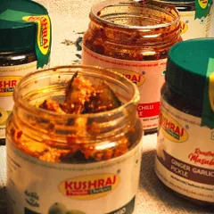 A glimpse of the variety I offer. Here you can see my tangy Mango Pickle, spicy Red Chilli Pickle, and the unique Ginger Garlic Pickle, all open and ready to be enjoyed. Each one is handmade with no artificial colours or preservatives.
