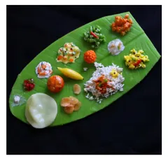 This is a complete South Indian banana leaf meal, a signature creation from my online course. You'll learn to make 15 distinct dishes, including rice, sambhar, paruppu (dal), and various poriyals, capturing the essence of a traditional feast.
