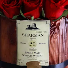 A close-up of the custom "Sharman" whiskey label I designed for the barrel cake.