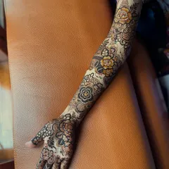 My signature floral design on a beautiful client. The pattern flows from the palm to the elbow, creating a stunning, cohesive look.