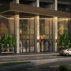 The modern entrance of the Pullman Hotel in the Middle East. This ground-level exterior view focuses on the sleek glass facade and welcoming entryway, designed to convey a sense of luxury and hospitality.