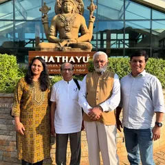 Our team with our honored guests, Dr. G.G. Gangadharan and Dr. Ravi Temarisa, in front of the iconic Dhanvantari statue.