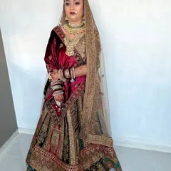 This bride is ready for her wedding day in a multi-toned velvet lehenga. I focused on creating a glowing complexion and defined eyes that complement her intricate jewellery and outfit.