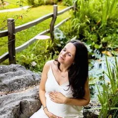 Sometimes, the best shots are the quiet ones. This expecting mother is taking a peaceful moment to soak in the sun and connect with her baby. My goal is to capture the feeling of pregnancy, and this serene portrait does just that.
