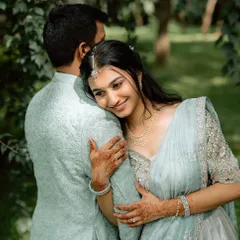 A sweet, candid moment. The makeup is natural and enhances her happy glow.