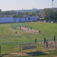 Our ground in Gurgaon, set against the backdrop of the Aravallis. We have multiple nets and open ground for match practice, ensuring comprehensive training for all our players.