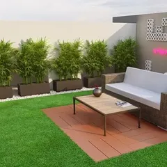 A design concept for a modern terrace. We used 3D rendering to show the client how bamboo planters could create a natural privacy screen next to a comfortable seating area on a wooden deck.