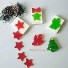 Getting into the holiday spirit with these festive soap bars. Featuring embeds like stars, bells, and Christmas trees, these soaps are designed to bring a little bit of seasonal cheer to your daily routine.