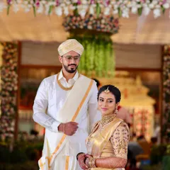 The complete bridal look for Pranitha and her groom. Her minimalist makeup and traditional attire create a picture of pure elegance for their wedding day.