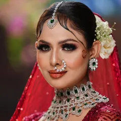 A timeless bride is always in style. This portrait, created by one of my students, showcases the classic red and green bridal palette, complete with flawless skin, defined eyes, and elegant styling that you will learn to perfect.
