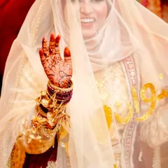 The pure joy of a bride on her wedding day. Seeing this smile is why I pour my heart into every design. This is a look at the beautiful, rich stain of my organic henna after it has fully developed.
