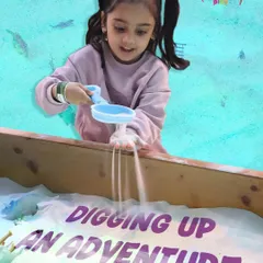Digging up an adventure! The sand pit is a magical place where imaginations run wild, whether they're building castles or searching for buried treasure.