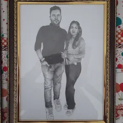 A custom A3-sized pencil sketch I did for a couple. Realistic pencil portraits are a popular choice for personal gifts, capturing a special memory in a timeless piece of art. This one is framed and ready to be displayed.