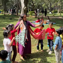 It's not just about listening, it's about feeling the story! Here, we're using colorful scarves to dance and express ourselves, bringing the narrative to life through movement. This kind of sensory play is a core part of our immersive workshops in Cubbon Park.