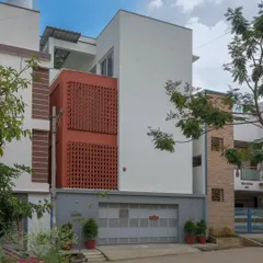 The Kadambini Residence features a bold, dynamic brick facade that stands in minimalist contrast to its surroundings. This design choice was central to the home's character, creating a visually striking exterior that filters light and ensures privacy.