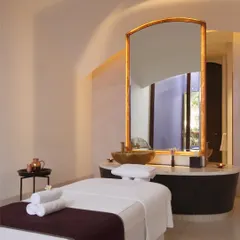 Every detail in our spa suites, from the elegant mirror to the brass sink, is chosen to create an atmosphere of luxury and calm for your private treatment.