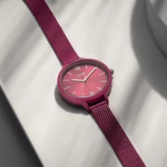 For this vibrant magenta Sonata watch, I used clean white surfaces and subtle shadows to make the color pop. The styling is modern and crisp, focusing entirely on the product's bold aesthetic.