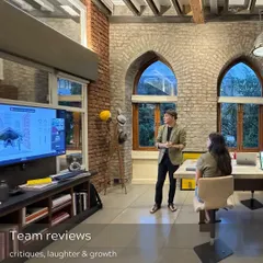 A snapshot of team reviews at The Loft. A space for critiques, laughter, and growth.