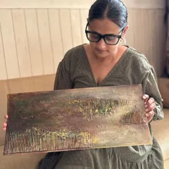 Holding another piece from my textured series. This one incorporates corrugated lines and a more muted color palette, exploring different types of rustic textures.