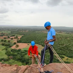 Instructors set up a complex rope system for multi-pitch rappelling. Our advanced courses cover the technical knowledge required for navigating big wall environments safely.