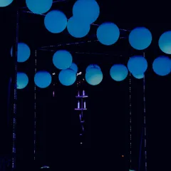 The 'Blue Pill' path, an alternate route in our Matrix-themed installation. This section featured serene blue glowing orbs suspended in a dark, mirrored space, offering a calmer, more ethereal experience.