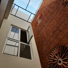 A beautiful display of brick craftsmanship. We designed this home around a central courtyard, so this feature wall is visible from almost everywhere. We gave the bricklayer a free hand, and the result is a stunning, personal piece of art that you would never get bored of.