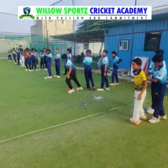 A snapshot of a fielding drill session. Focus, discipline, and dedication are visible as our players prepare to take catches.