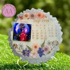 Celebrating a silver jubilee is a huge milestone. I created this special anniversary frame with a silver glitter finish and preserved flowers to honor 25 years of love.
