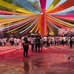 A snapshot of the massive Holi festival I helped set up at Shivaji Park. My work included the colorful overhead canopy decoration that stretched across the entire ground, creating a fantastic atmosphere for thousands of people.