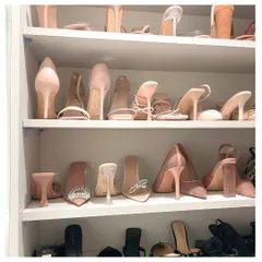 A beautifully organized shoe closet featuring a collection of nude heels. By arranging them neatly on shelves, each pair is easy to see and access, turning a simple closet into a personal boutique.