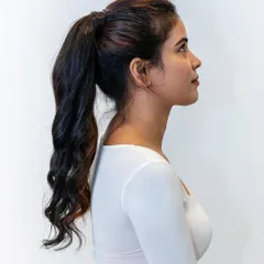 This is the final look of our wrap-around ponytail extension. It creates a full, high-volume ponytail that looks completely natural and is perfect for a quick, glamorous hairstyle for any occasion.