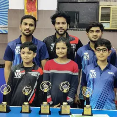 The team after a successful run at the Gautam Budh Nagar Table Tennis Championship. I'm pictured here with some of our medalists and their well-deserved trophies.