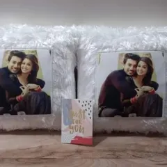 A clear shot of the two personalized fur pillows before they were sent out. These make for a cozy and personal gift.
