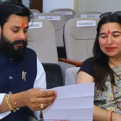 Discussing the program details at the Yog Ratn Award event. Every event is an opportunity to connect with fellow practitioners and share our passion for yoga.