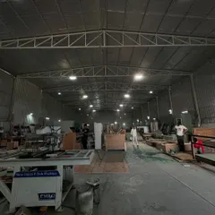 This is where the magic of our furniture comes to life. A wide shot of our factory, where our team of talented artisans and craftsmen transform creative ideas into beautifully executed pieces.