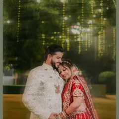 In the quiet moments after the vows, the real story unfolds. I focus on capturing the gentle, unscripted connections between a couple, like this tender embrace under soft lights. These are the portraits that you will cherish for a lifetime.
