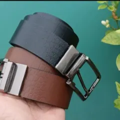I offer reversible belts that give you two color options in one. This one has a black textured side and a smooth brown side.