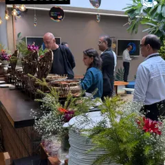 We create beautiful, inviting food displays even for large corporate functions. Here is our lush, green-themed buffet setup for a Deloitte event.