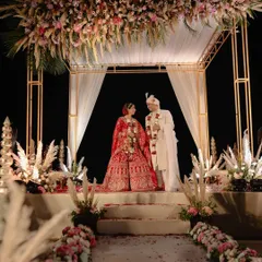 We love a grand celebration, and this sunset wedding in Goa was a dream. This shot of the mandap shows the scale and beauty we can capture, ensuring that every element of your destination wedding, big or small, is remembered forever.