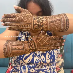 Another view of the semi-bridal mehendi, showing how the design looks from a different angle. The patterns include florals, checks, and traditional motifs.