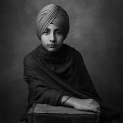 Another classic black and white pose from this session. The composition is simple and strong, focusing all attention on his expressive face.