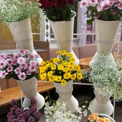 A selection of fresh, vibrant flowers ready for guests to create their own arrangements at the Flower Bar.
