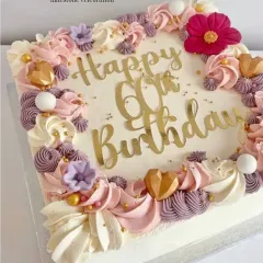 The client's reference picture for a 60th birthday, which inspired the final design for the 75th birthday cake. I love collaborating on ideas.